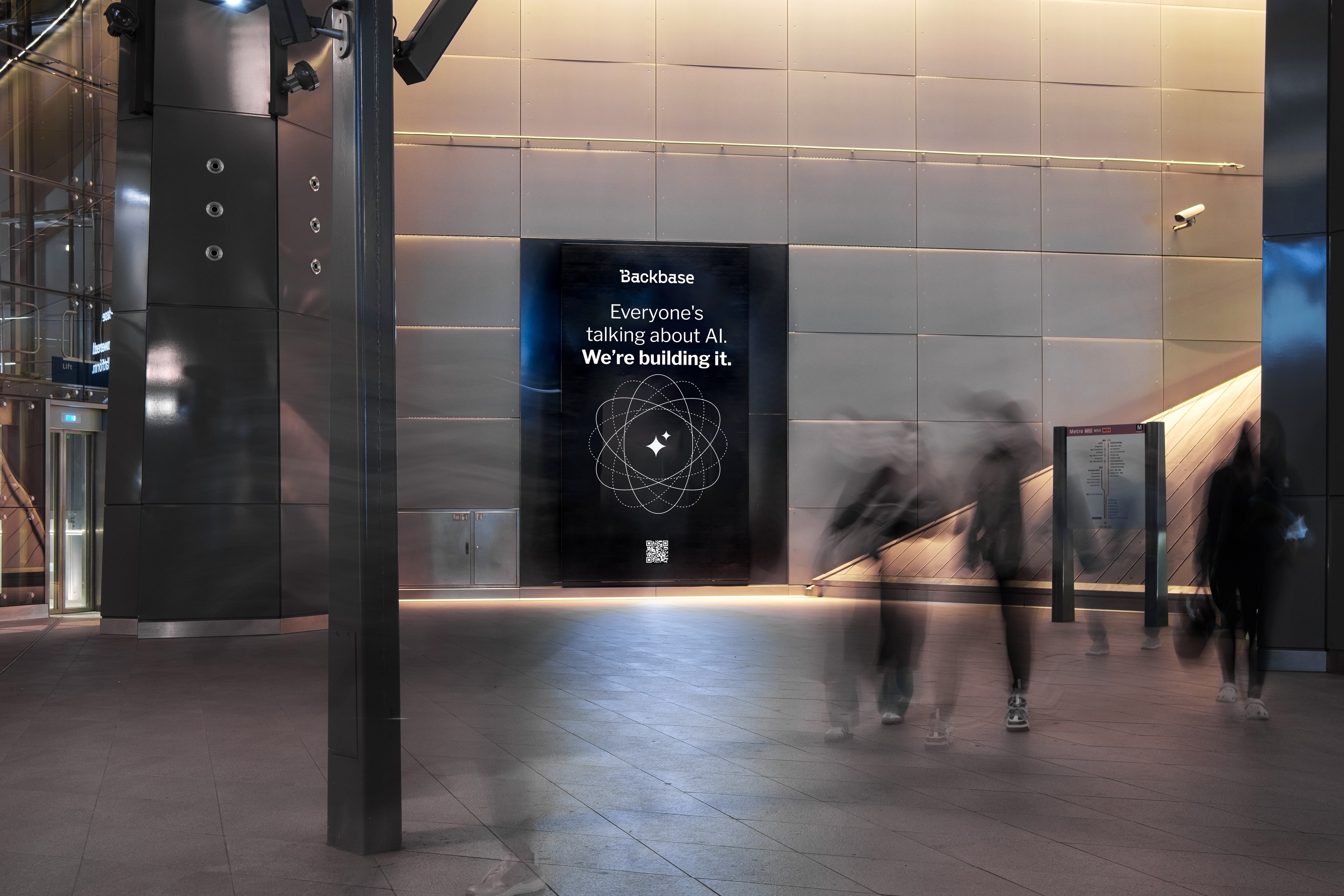 Backbase digital screen in metro station - Everyone's talking about AI, We're building it